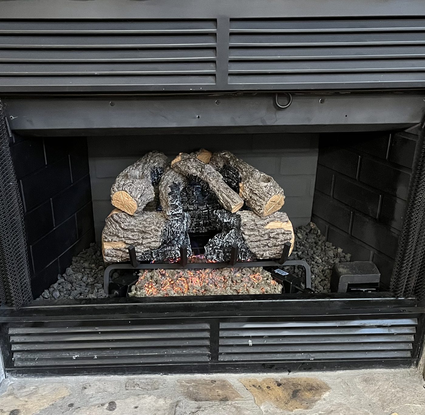 Gas log fireplace installation
