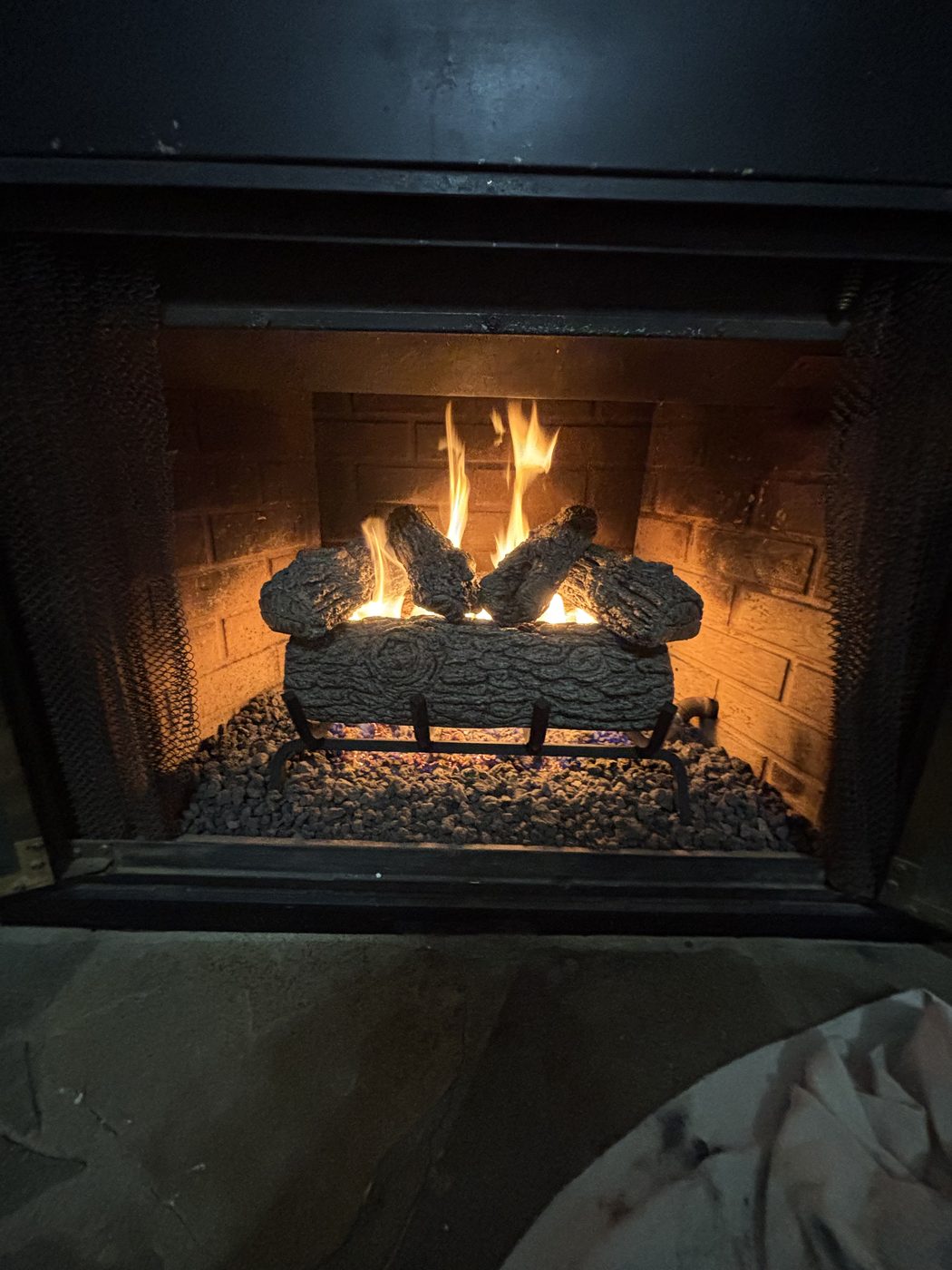 Gas log fireplace installation