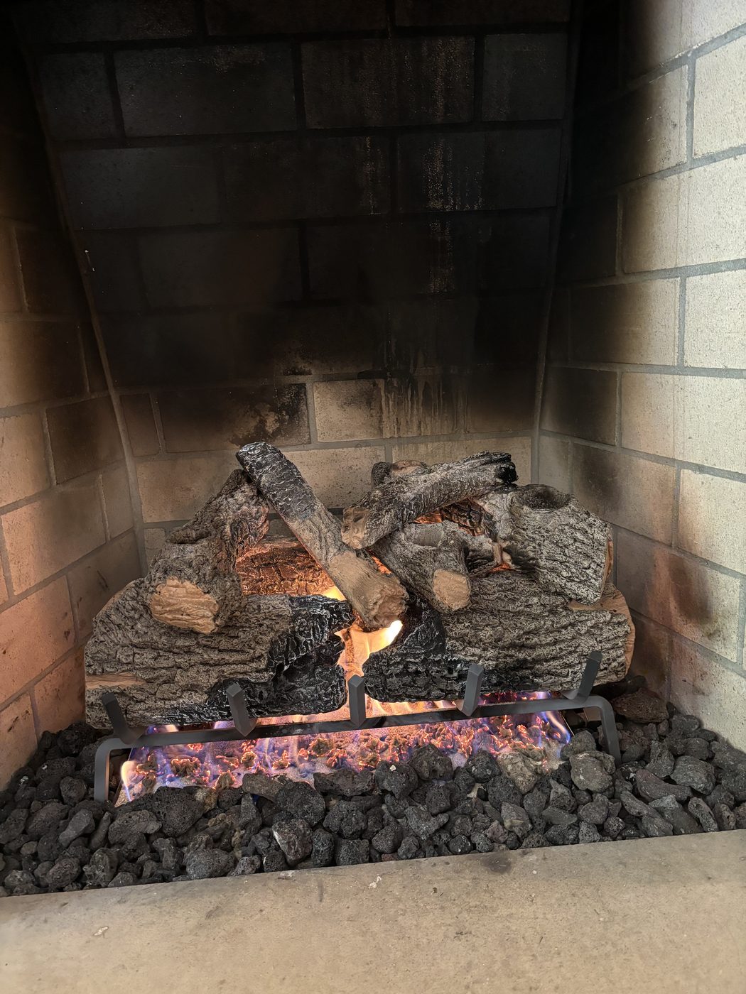 Gas log fireplace installation