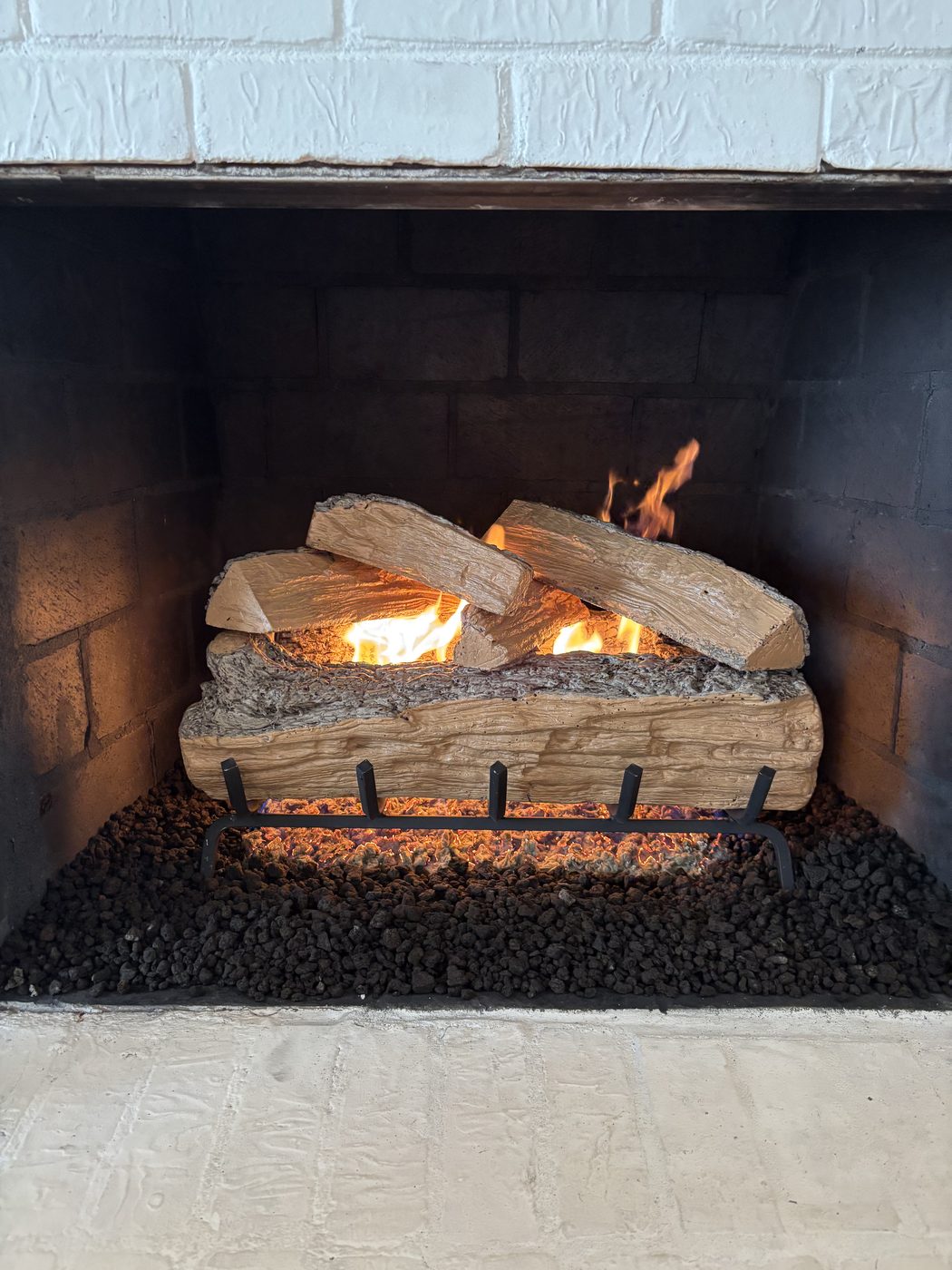 Gas log fireplace installation
