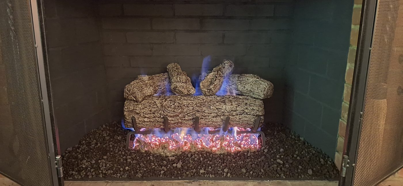 Gas log fireplace installation